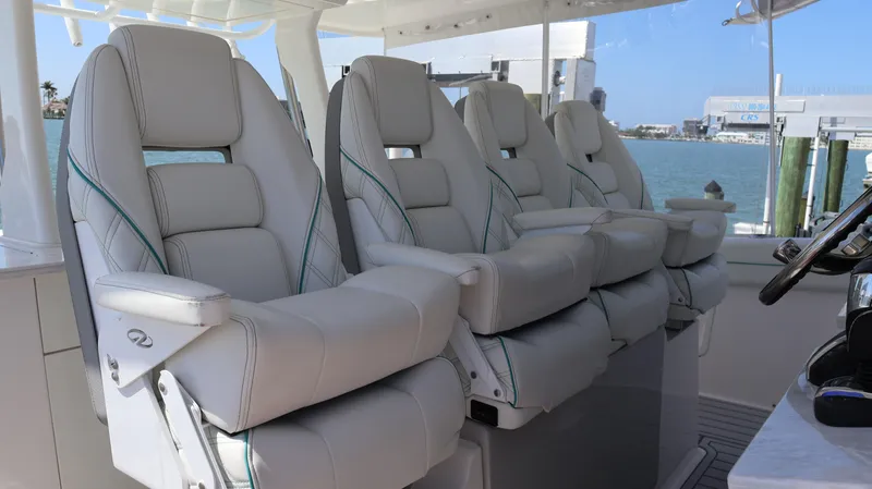  Yacht Photos Pics Luxurious seating on 2022 Regal 38 SAV boat, featuring plush, ergonomic design.