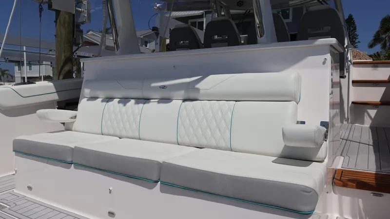  Yacht Photos Pics 2022 Regal 38 SAV boat with luxurious white seating and modern design.