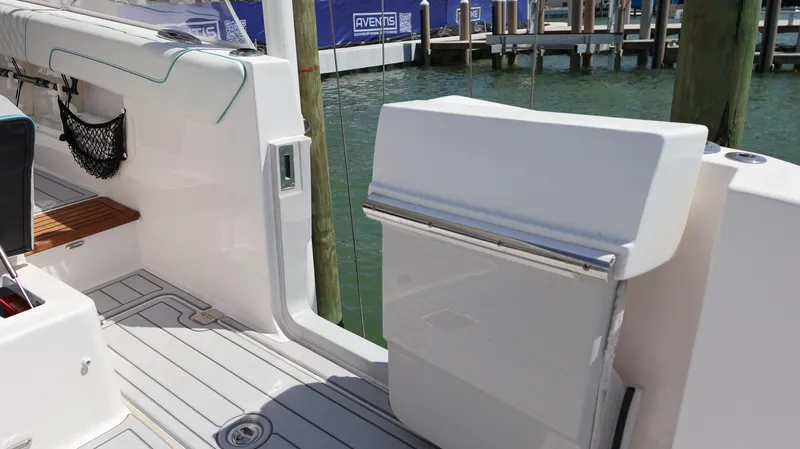  Yacht Photos Pics 2022 Regal 38 SAV boat interior with open deck and water view.