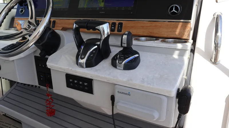  Yacht Photos Pics Control panel of 2022 Regal 38 SAV boat with Garmin navigation system.