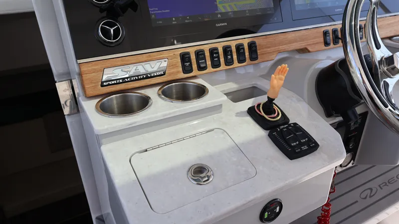  Yacht Photos Pics Control panel of 2022 Regal 38 SAV boat with unique decor and modern features.