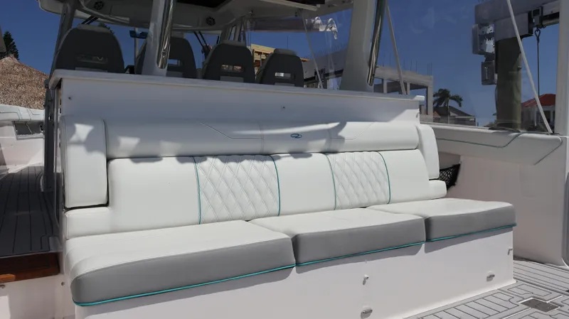  Yacht Photos Pics 2022 Regal 38 SAV boat with luxurious white seating and modern design.