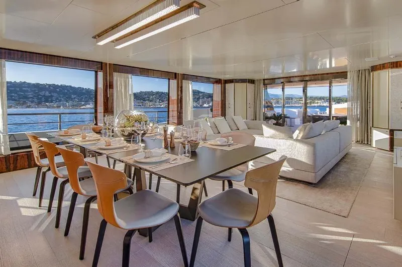 Oceanic 143 Yacht Photos Pics Luxurious interior of 2023 Canados Expedition Yacht with elegant dining and seating area.