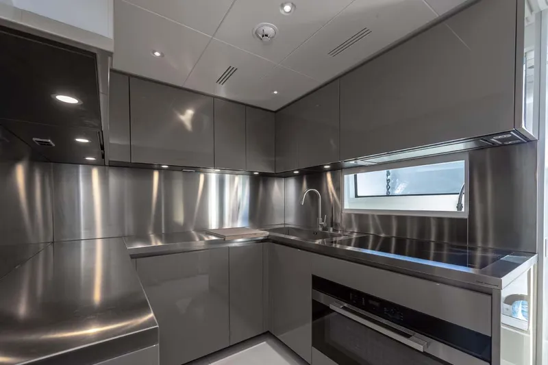 Oceanic 143 Yacht Photos Pics Modern kitchen in 2023 Canados Expedition Yacht with sleek stainless steel design.