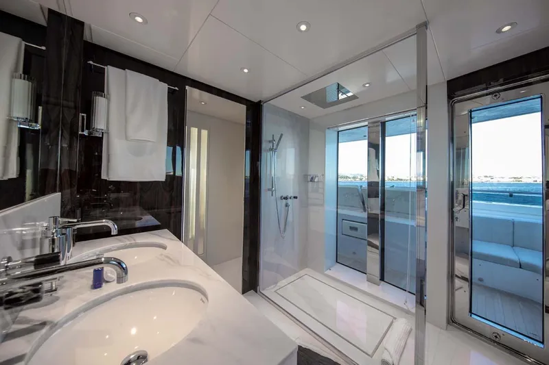 Oceanic 143 Yacht Photos Pics Luxurious bathroom on 2023 Canados Expedition Yacht with modern fixtures and ocean view.