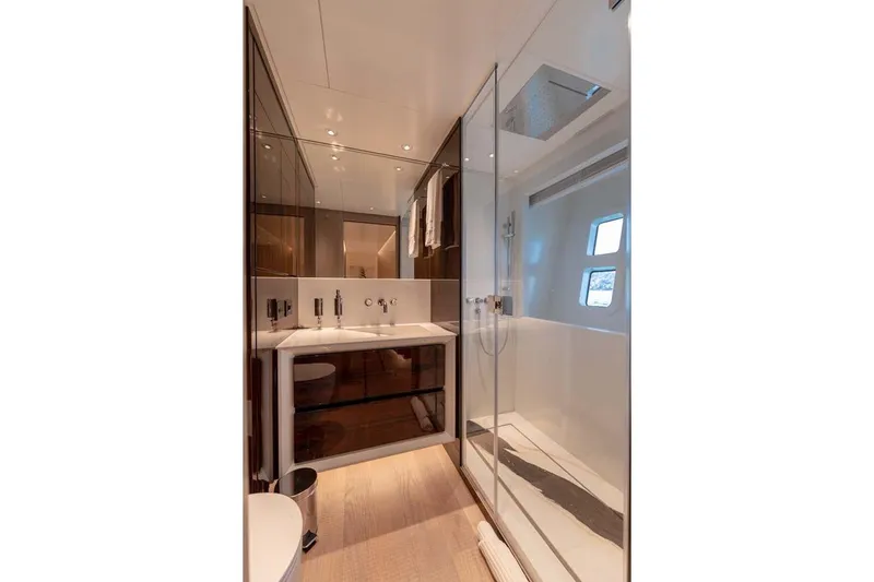 Oceanic 143 Yacht Photos Pics Luxurious bathroom in 2023 Canados Expedition Yacht with modern fixtures and elegant design.