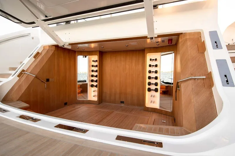 Oceanic 143 Yacht Photos Pics Luxurious interior of 2023 Canados Expedition Yacht with wooden finishes and modern design.