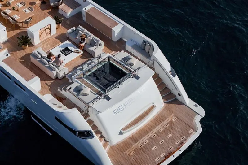 Oceanic 143 Yacht Photos Pics Luxurious 2023 Canados Expedition Yacht with spacious deck and elegant seating area.