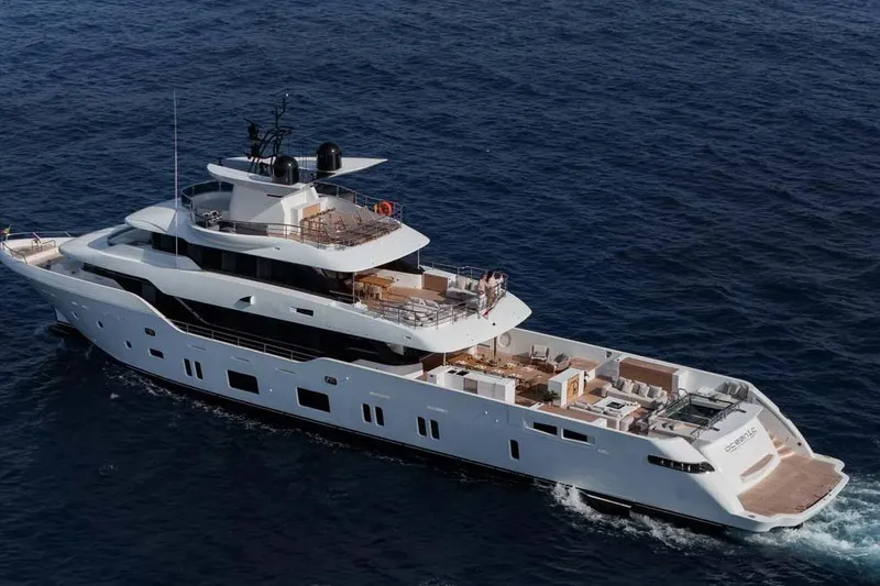Oceanic 143 Yacht Photos Pics 2023 Canados Expedition Yacht cruising on open sea, showcasing luxury design and spacious decks.