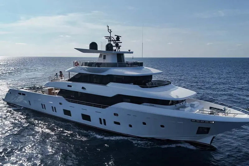 Oceanic 143 Yacht Photos Pics Luxurious 2023 Canados Expedition Yacht cruising on open sea under clear skies.