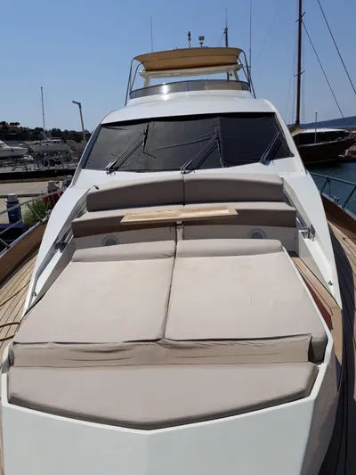  Yacht Photos Pics Numarine 78 Fly 2008 yacht with sun deck in harbor.