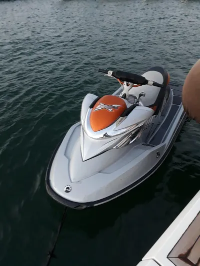  Yacht Photos Pics Jet ski on water beside Numarine 78 Fly yacht, 2008 model.