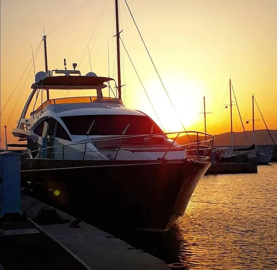  Yacht Photos Pics Numarine 78 Fly yacht at sunset in harbor, year 2008.