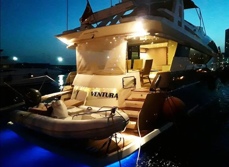  Yacht Photos Pics Numarine 78 Fly 2008 yacht at night in harbor.