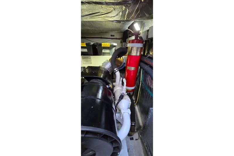  Yacht Photos Pics Engine room of 2006 Cruisers Yachts 520 Express, featuring mechanical components and systems.