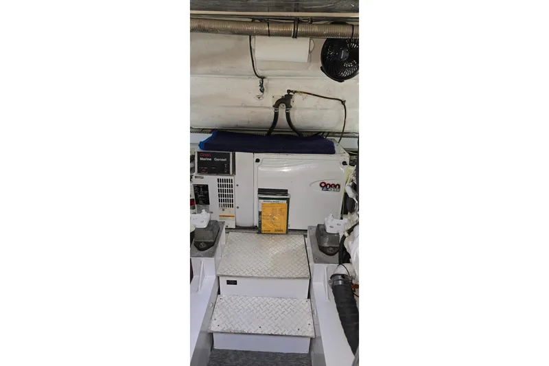  Yacht Photos Pics Engine room of 2006 Cruisers Yachts 520 Express with Onan marine generator.