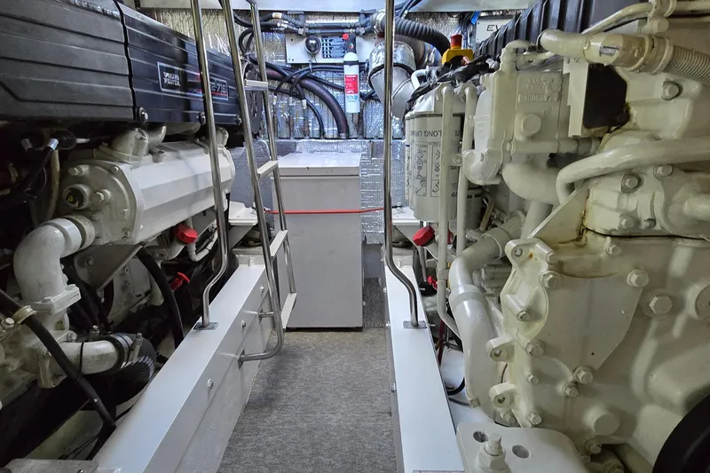  Yacht Photos Pics Engine room of 2006 Cruisers Yachts 520 Express, featuring Volvo Penta engines.