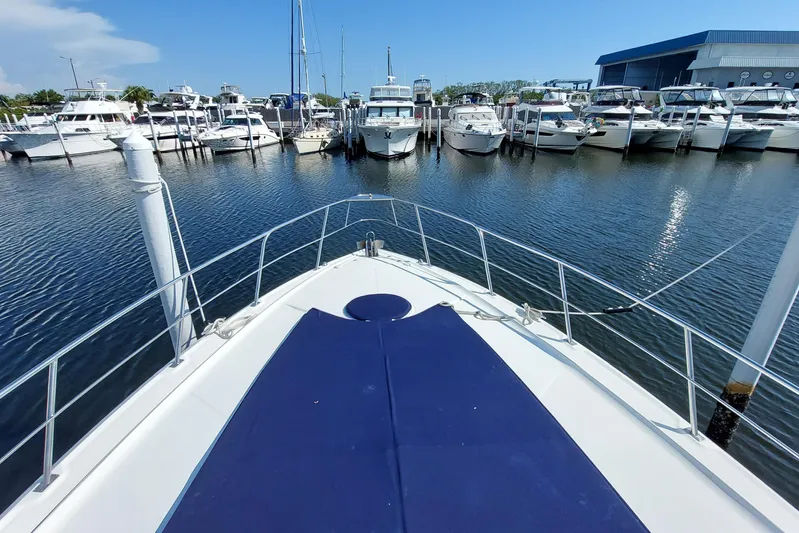  Yacht Photos Pics Bow view of 2006 Cruisers Yachts 520 Express docked at marina.