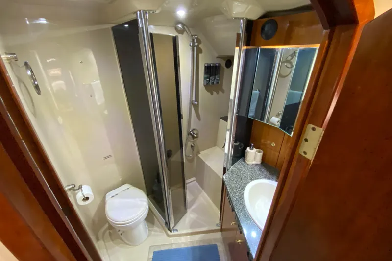  Yacht Photos Pics Luxurious bathroom in 2006 Cruisers Yachts 520 Express with shower and vanity.