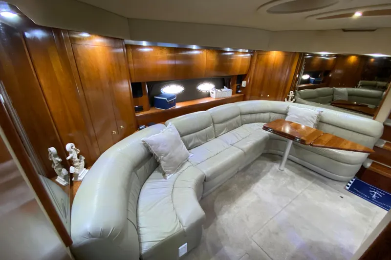  Yacht Photos Pics Luxurious 2006 Cruisers Yachts 520 Express interior with plush seating and elegant wood finishes.