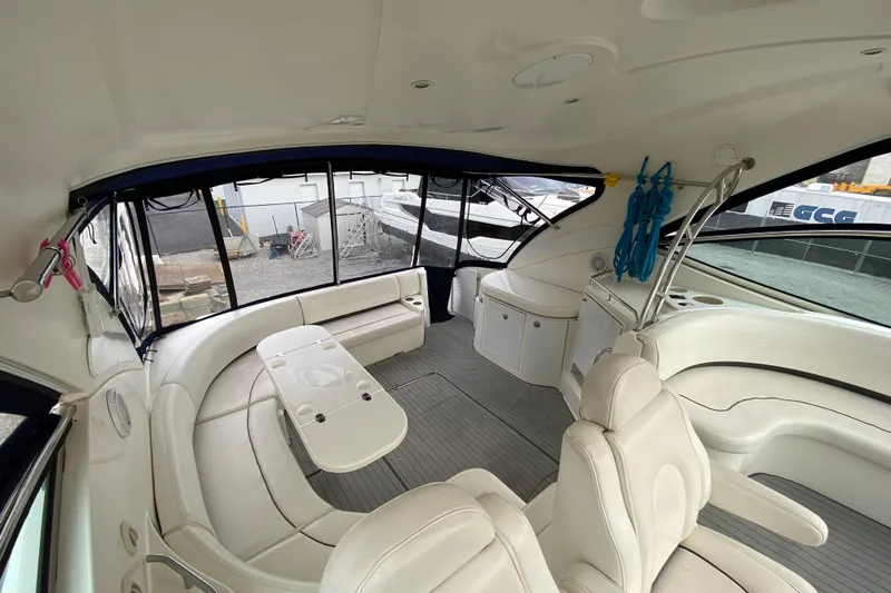  Yacht Photos Pics Interior of 2006 Cruisers Yachts 520 Express, featuring spacious seating and modern amenities.