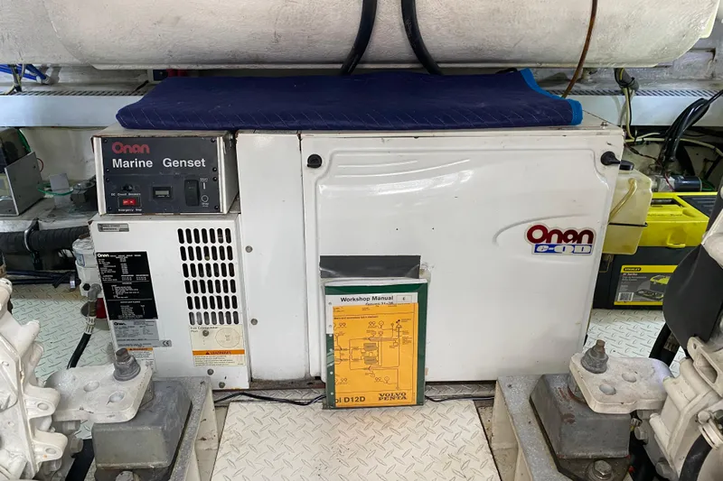  Yacht Photos Pics Engine room of 2006 Cruisers Yachts 520 Express with Onan Marine Genset.