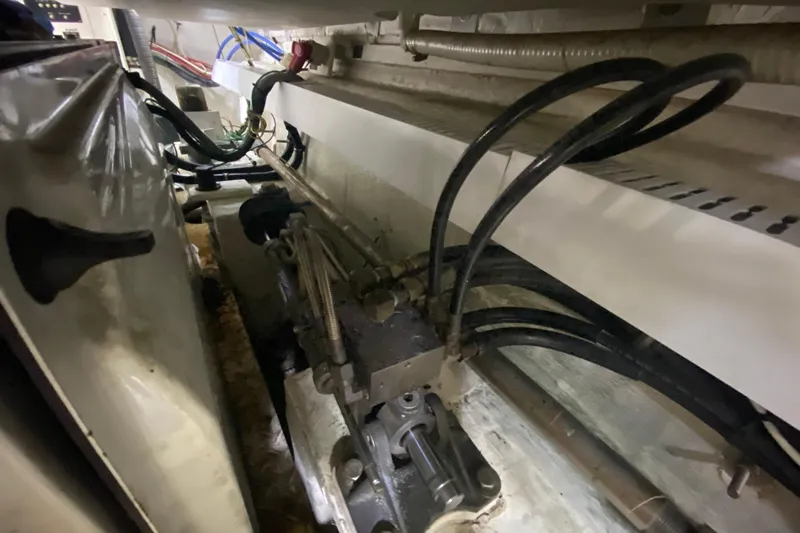  Yacht Photos Pics Engine room of 2006 Cruisers Yachts 520 Express with visible cables and components.