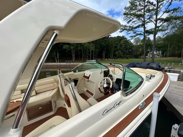  Yacht Photos Pics 2022 Chris-Craft Launch GT 28 Surf boat interior with elegant design and wood accents.