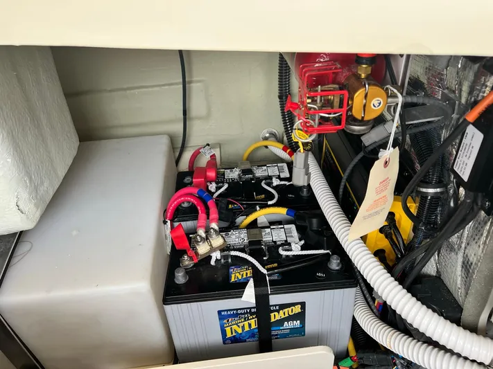  Yacht Photos Pics 2022 Chris-Craft Launch GT 28 Surf battery compartment with wiring and components.