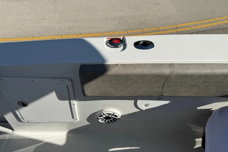  Yacht Photos Pics 2025 Sea Hunt Ultra 305 SE boat interior with speaker and control panel.