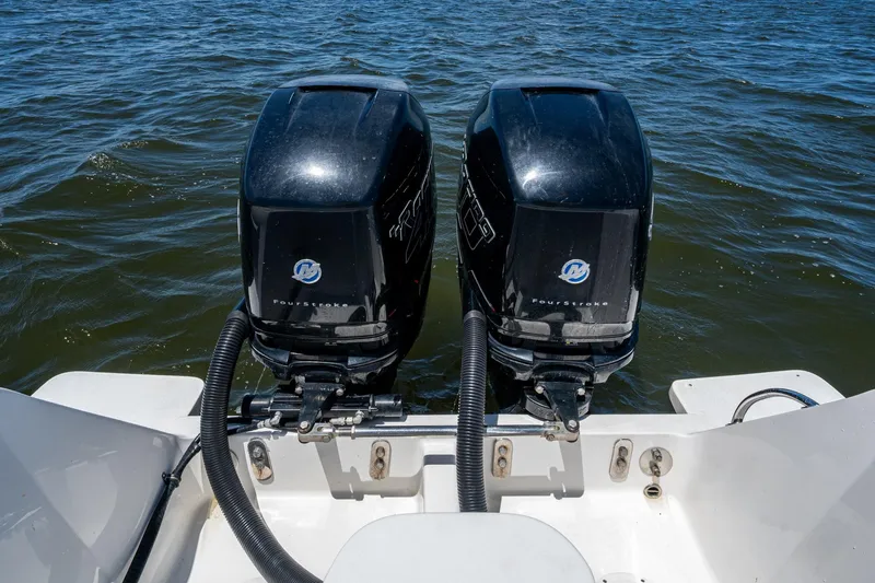  Yacht Photos Pics Twin outboard motors on a 2010 Intrepid 323 OPEN boat in open water.