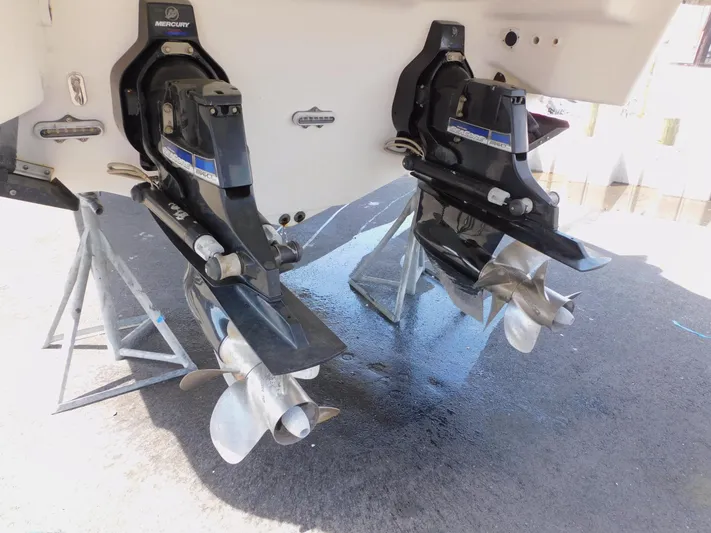 Tide Runner Yacht Photos Pics 2015 Formula Bowrider 290 boat with dual Mercury outboard engines on stands.