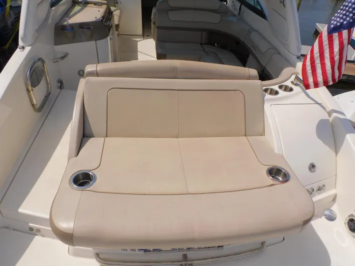 Tide Runner Yacht Photos Pics 2015 Formula Bowrider 290 interior with beige seating and cup holders.