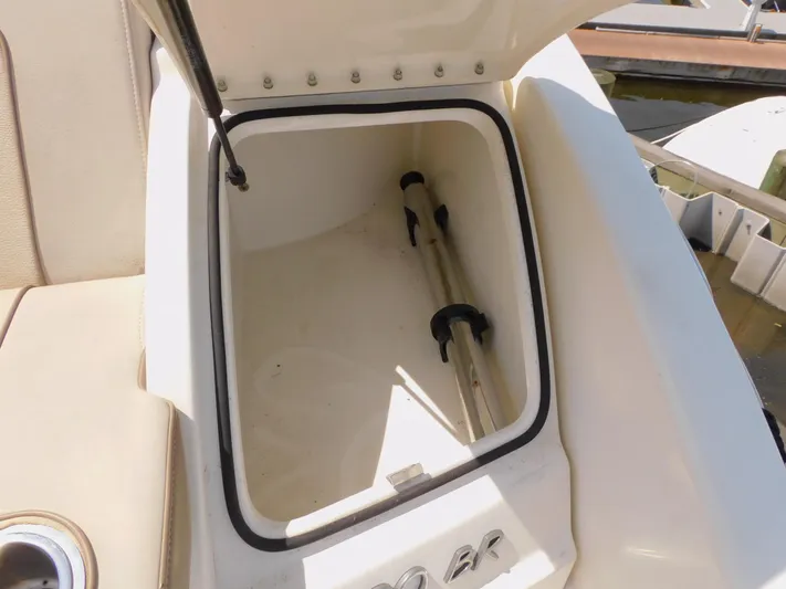 Tide Runner Yacht Photos Pics Open storage compartment on 2015 Formula Bowrider 290 boat, showing interior space.