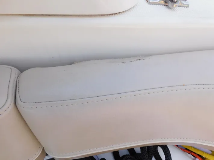 Tide Runner Yacht Photos Pics 2015 Formula Bowrider 290 seat with slight wear and visible stitching.