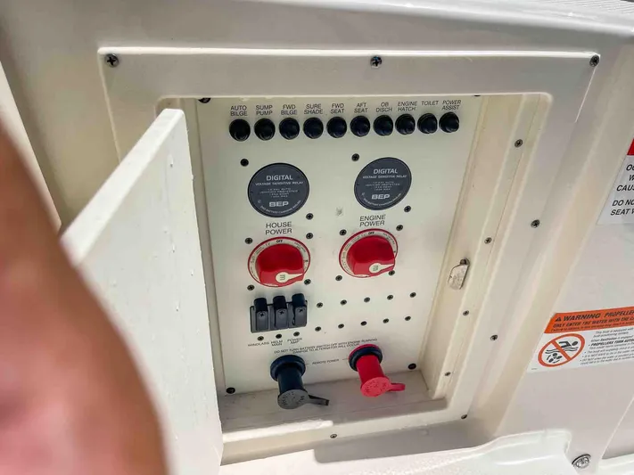  Yacht Photos Pics Control panel of 2021 Chaparral 300 OSX boat with switches and dials.