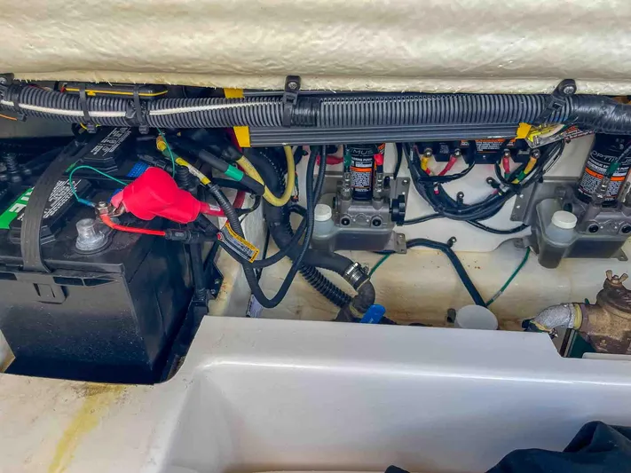  Yacht Photos Pics Engine compartment of 2021 Chaparral 300 OSX with battery and wiring.