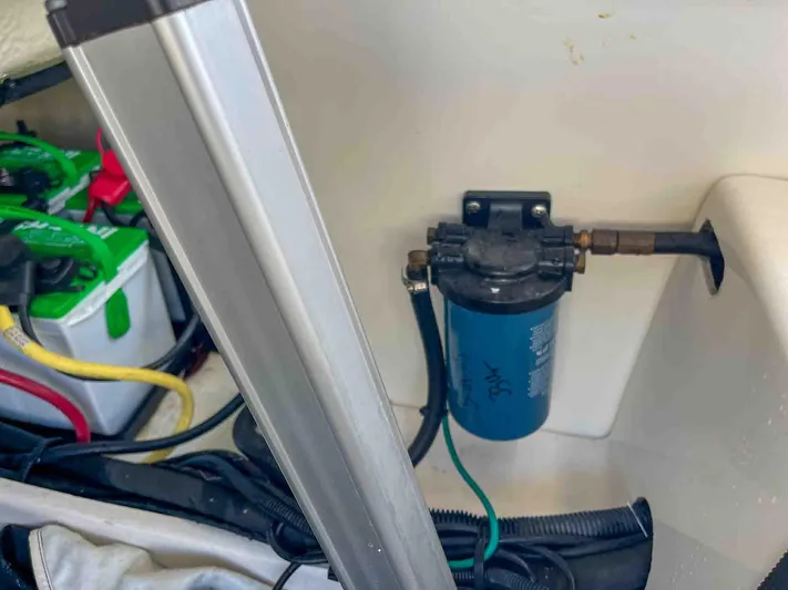  Yacht Photos Pics 2021 Chaparral 300 OSX engine compartment with filter and battery setup.