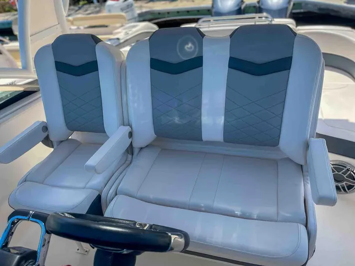  Yacht Photos Pics 2021 Chaparral 300 OSX boat seats, featuring modern design and comfortable upholstery.