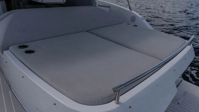  Yacht Photos Pics 2023 Azimut Atlantis 45 yacht with spacious sunbed on deck, overlooking the ocean.