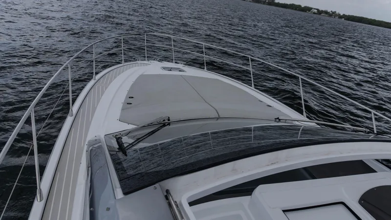  Yacht Photos Pics 2023 Azimut Atlantis 45 yacht cruising on open water, showcasing sleek design and luxury.