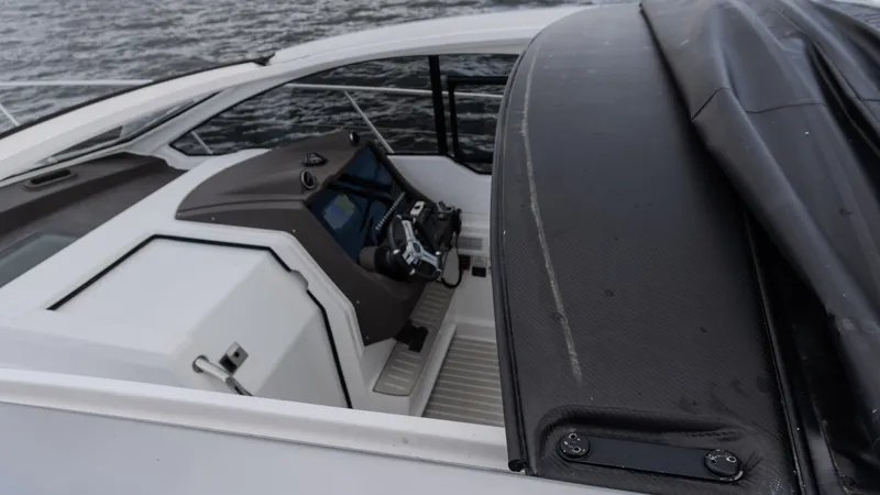  Yacht Photos Pics 2023 Azimut Atlantis 45 yacht helm with modern controls and sleek design.