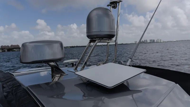  Yacht Photos Pics 2023 Azimut Atlantis 45 yacht with advanced navigation equipment on deck, cruising on open water.