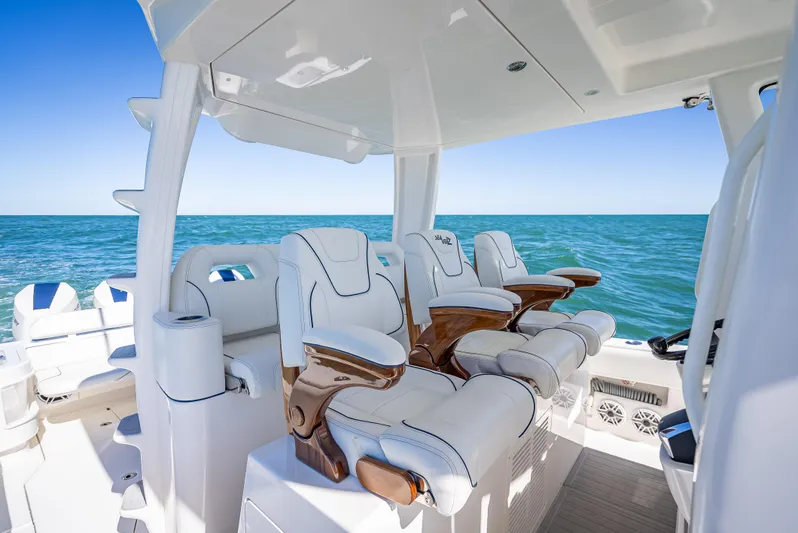  Yacht Photos Pics 2024 SeaVee 420Z luxury boat interior with plush seating on open water.