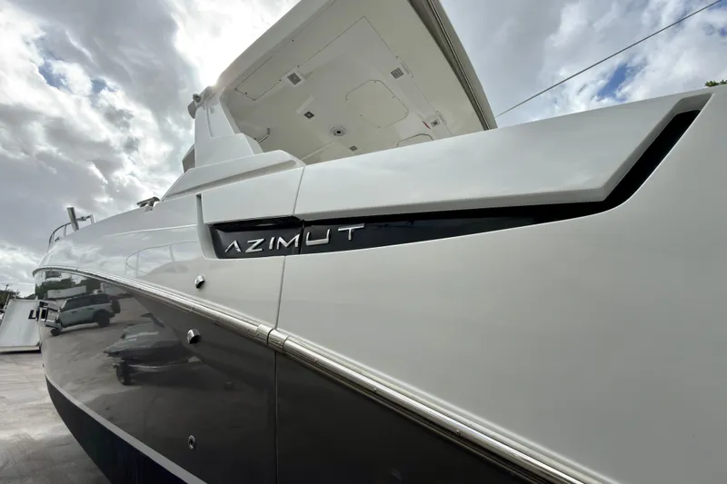  Yacht Photos Pics 2019 Azimut Verve 40 yacht, sleek design under cloudy sky.
