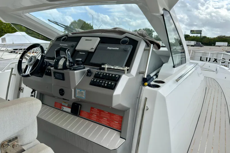  Yacht Photos Pics 2019 Azimut Verve 40 yacht helm with advanced navigation controls and sleek design.