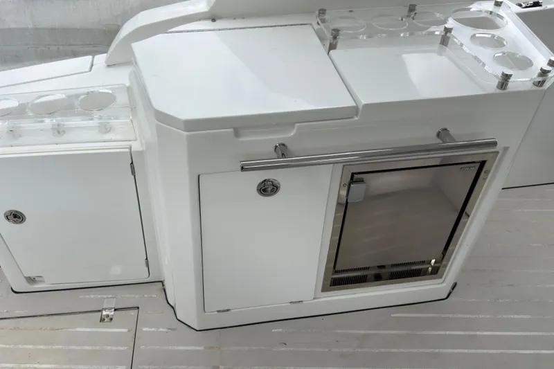  Yacht Photos Pics 2019 Azimut Verve 40 yacht kitchenette with storage and mini fridge.