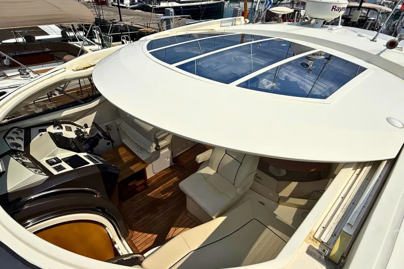 Yacht Photos Pics Luxurious 2007 Absolute 56 HT yacht interior with sleek design and spacious seating.