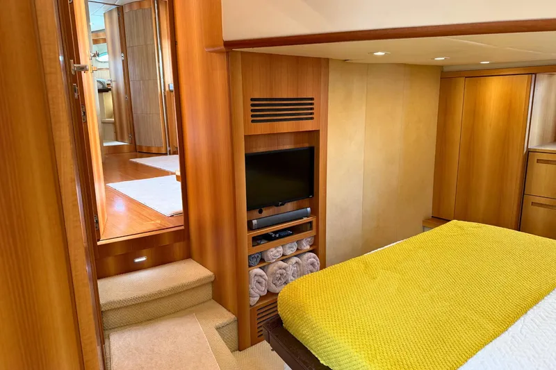  Yacht Photos Pics Luxurious 2007 Absolute 56 HT yacht interior with cozy bedroom and modern amenities.