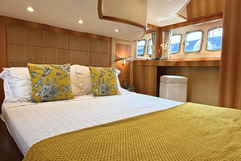  Yacht Photos Pics Luxurious cabin interior of 2007 Absolute 56 HT yacht with elegant bedding and decor.